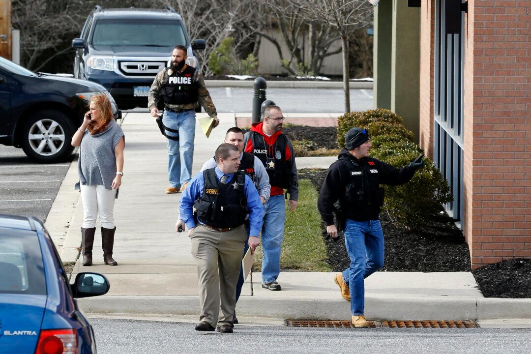 2 Deputies Wounded, Suspect Dead in Shopping Center Shootout