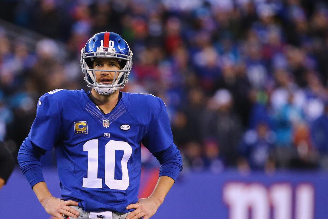 Eli Manning Explains His Non-Reaction to Peyton Manning Touchdown in Super Bowl