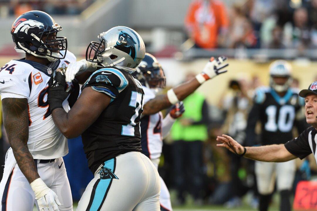 Watch: Carolina Panthers Offensive Tackle Michael Oher Slides on Torn-Up Turf During Super Bowl