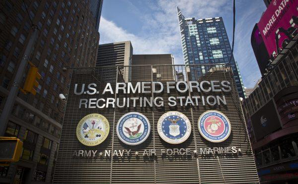 The Times Square military recruiting station displays insignia for each military branch in New York. (AP Photo/Bebeto Matthews, File)
