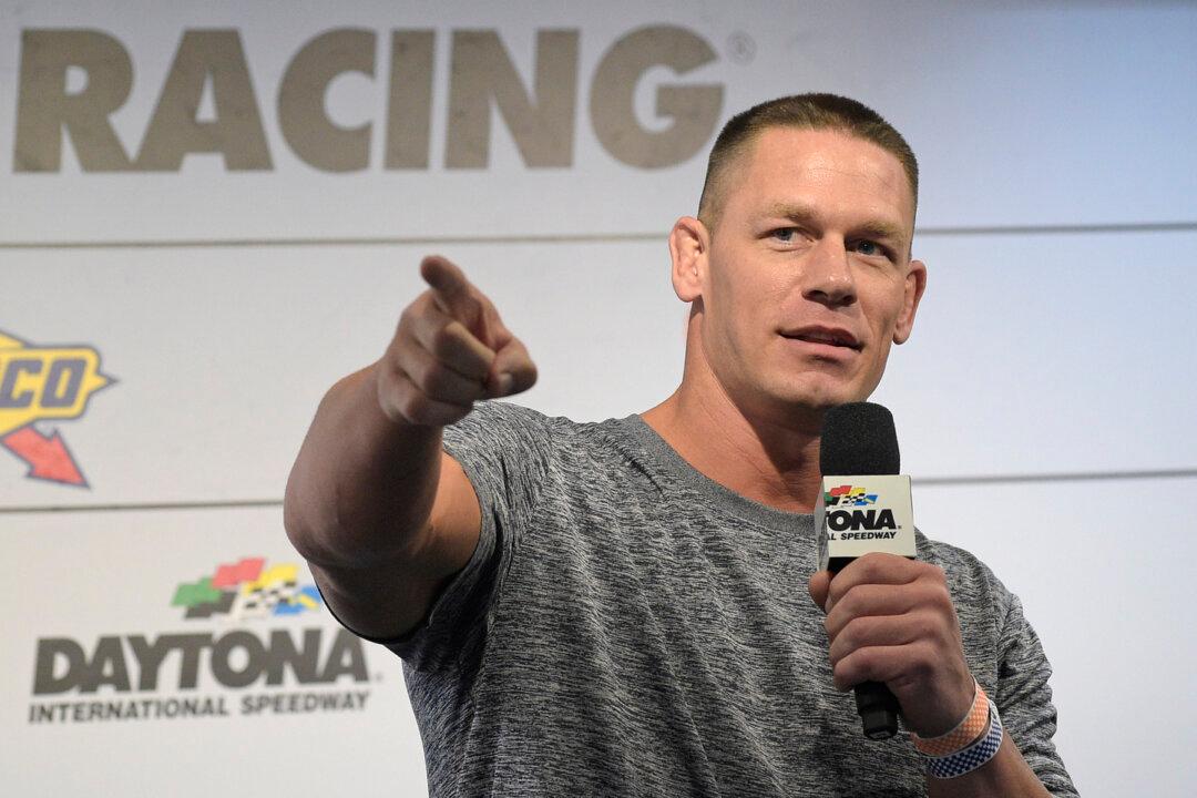 Watch: NASCAR Reporter Whips WWE Wrestler John Cena in the Face With Her Ponytail at Daytona 500