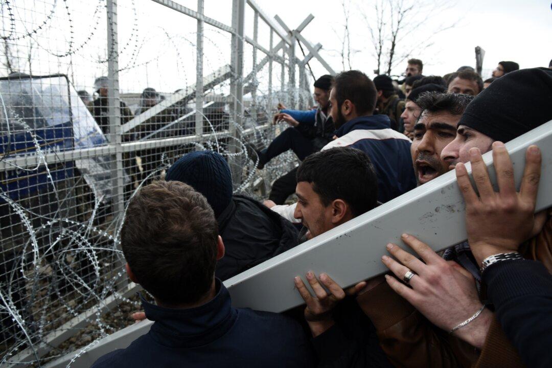 Europe’s Crisis Worsens: Migrants Face Razor Wire, Tear Gas