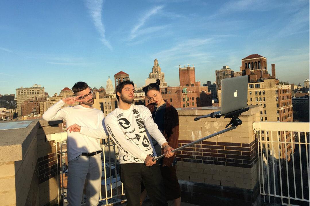 Artists Create The MacBook Selfie Stick
