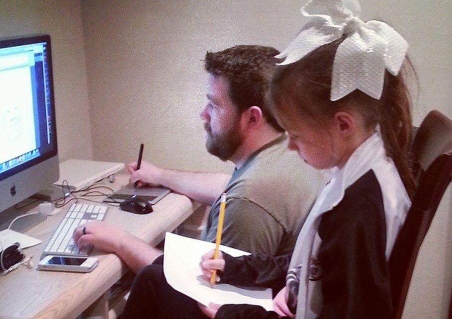 Photo of Father & Daughter Sharing Special Moment Overshadowed by Optical Illusion