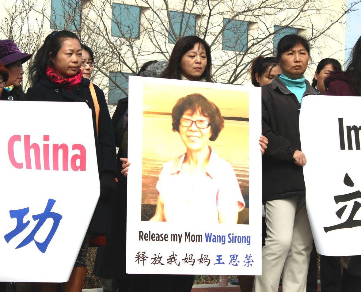 Banner With Festive Message Leads to Lock Up of 65-Year-Old Chinese Woman