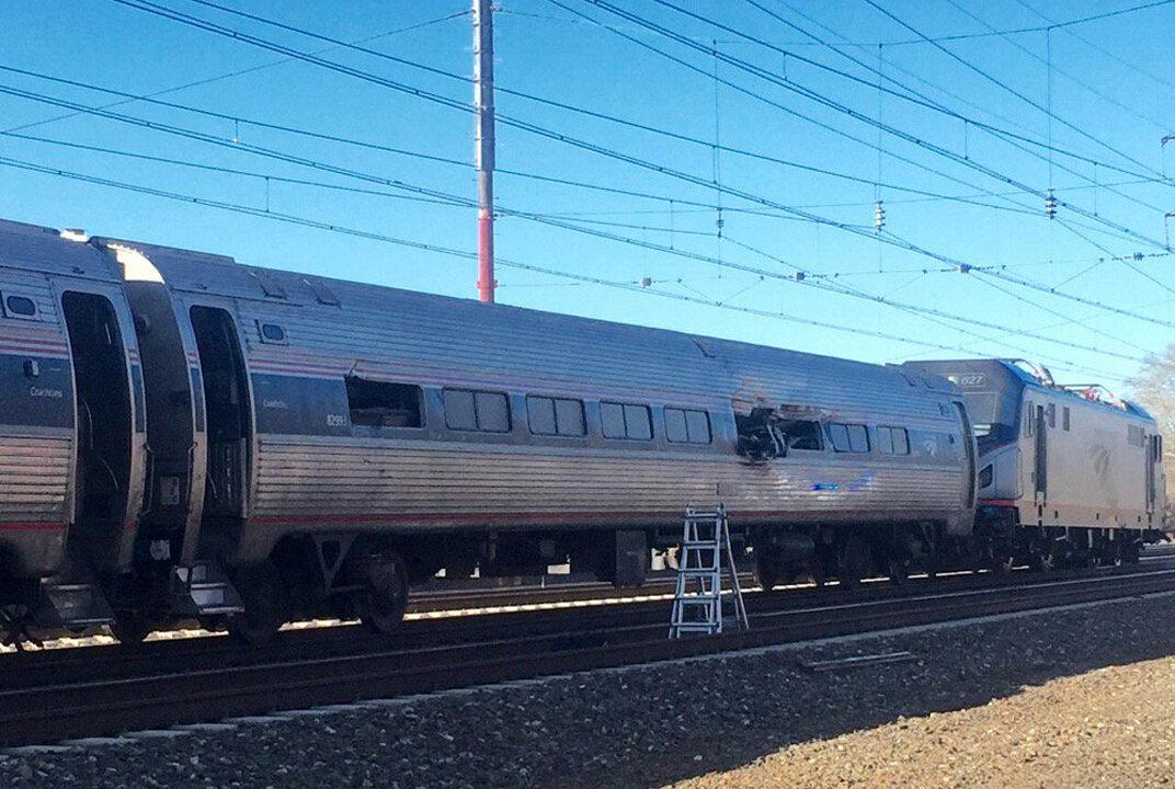 Amtrak Train Crashes Near Philadelphia, Lead Engine Derails