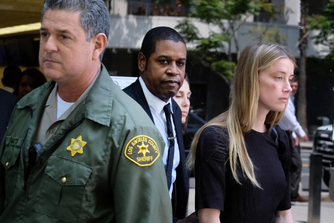 Amber Heard Granted Temporary Restraining Order Against Johnny Depp