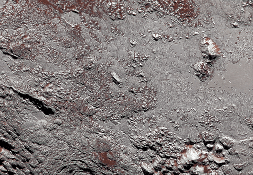 Photos: Never Before Seen Closeup of Pluto’s Surface Captured by Spacecraft