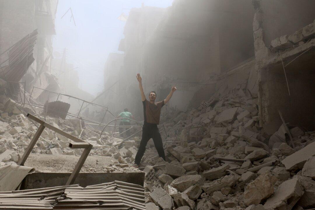 Syrian Activists Say Airstrikes on Rebel-Held Area Kill 25