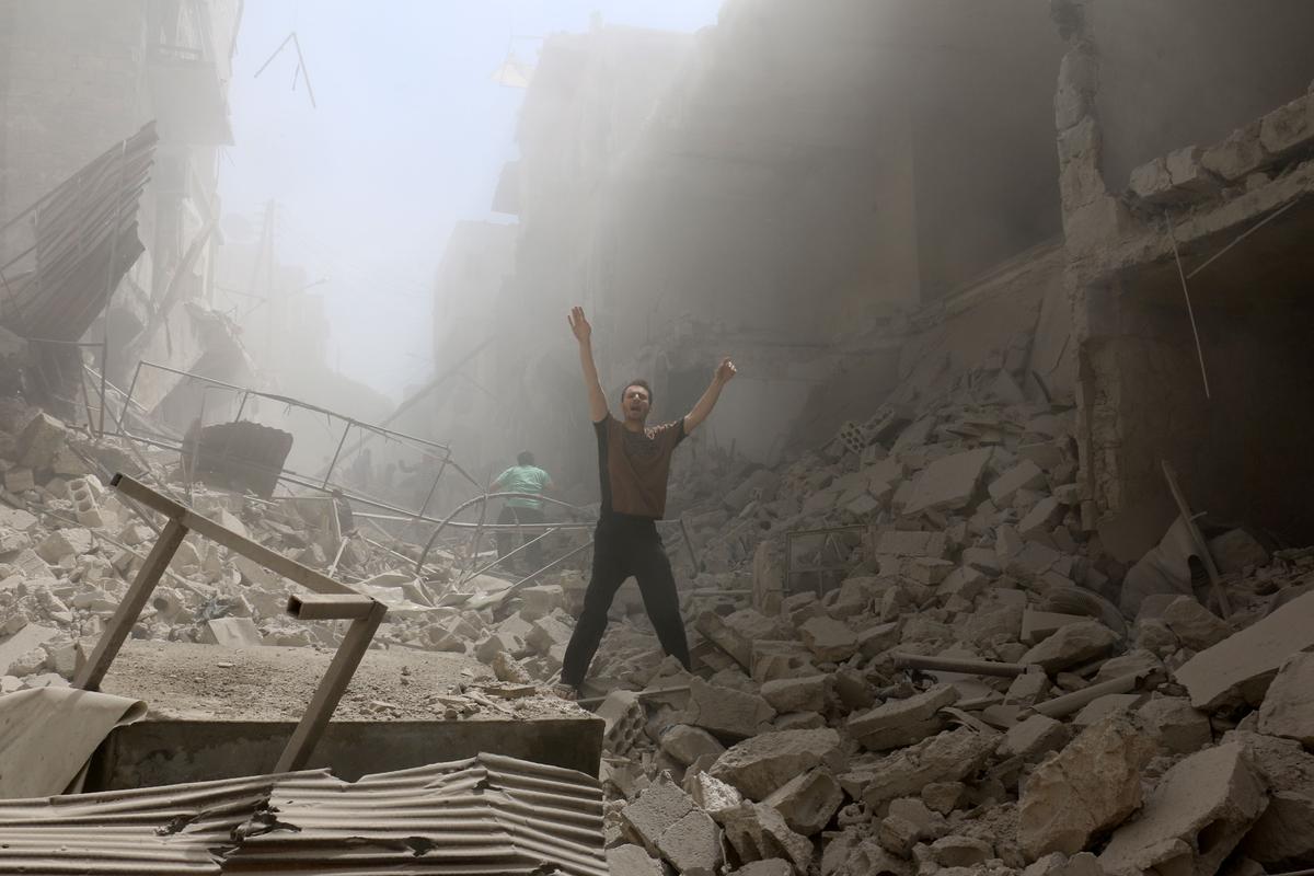 Syrian Activists Say Airstrikes on Rebel-Held Area Kill 25