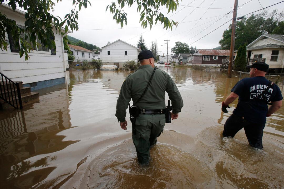 West Virginia Floods: 23 Dead, Search and Rescue Continues