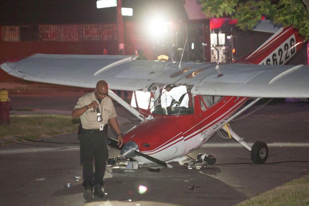 Plane Crash-Lands On Detroit Street, 2 Injured