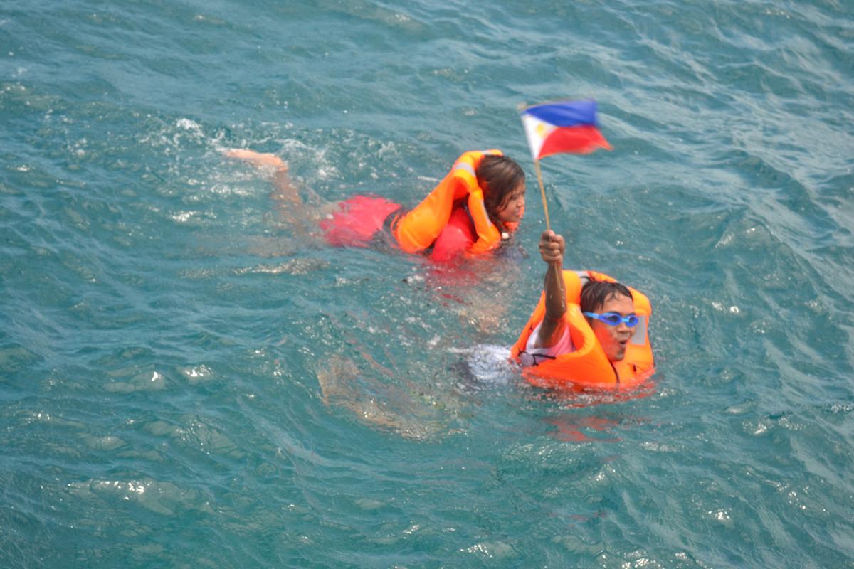 How Filipinos Raised Their Flag Over Scarborough Shoal