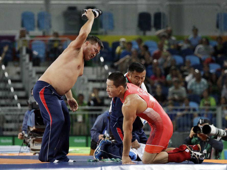 Mongolian Wrestling Coaches Strip Down in Public Protest at Rio Olympics