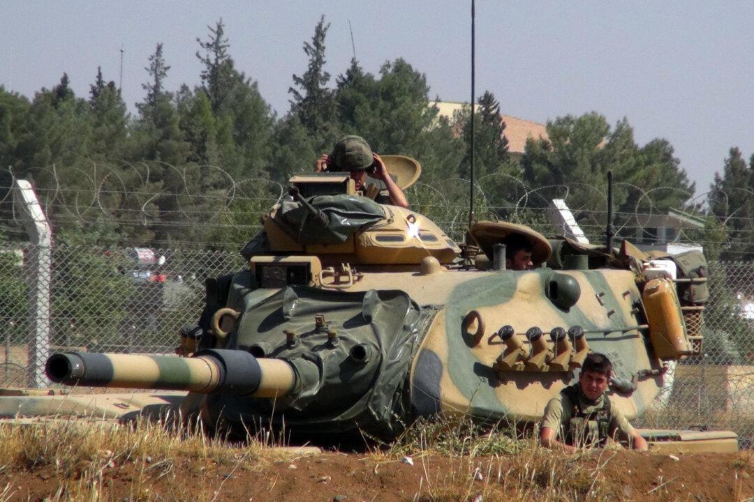 Syrian Troops Advance Near Aleppo in Attempt to Impose Siege