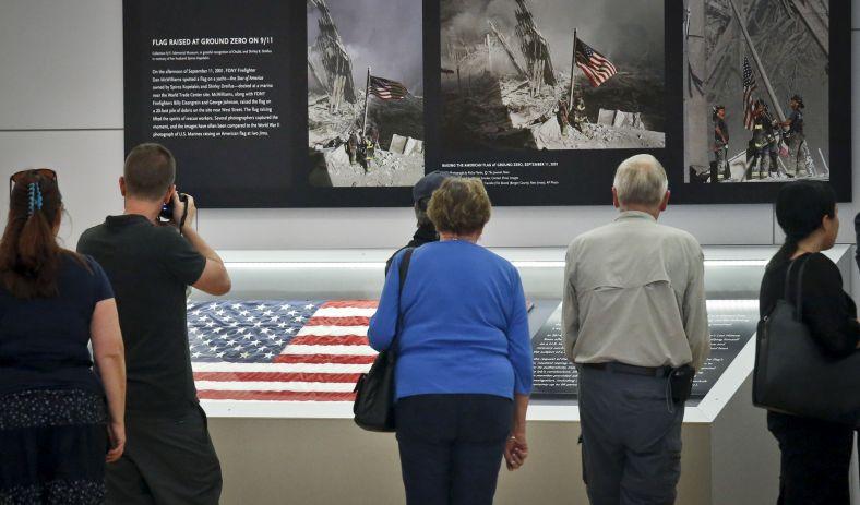 Flag That Firefighters Raised at Ground Zero Returns to WTC Site