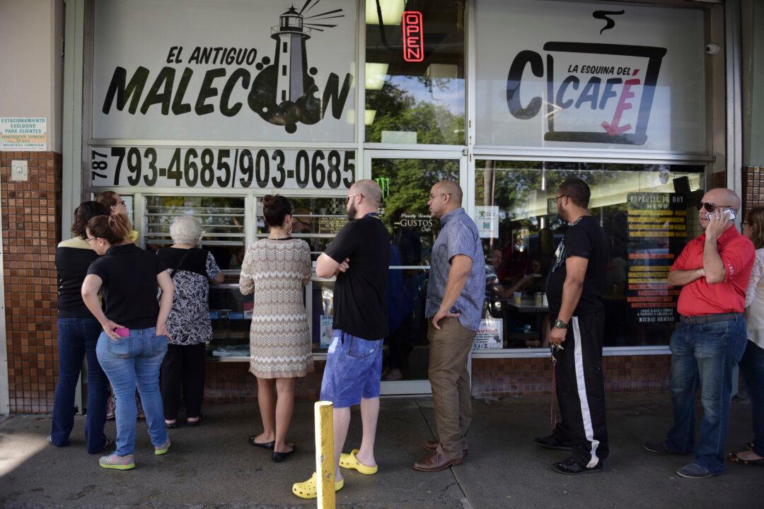 Power Slowly Coming Back After Blackout Darkens Puerto Rico