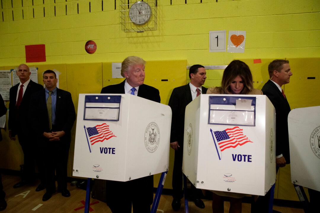 Photo: Trump Glances Over at Wife While Voting