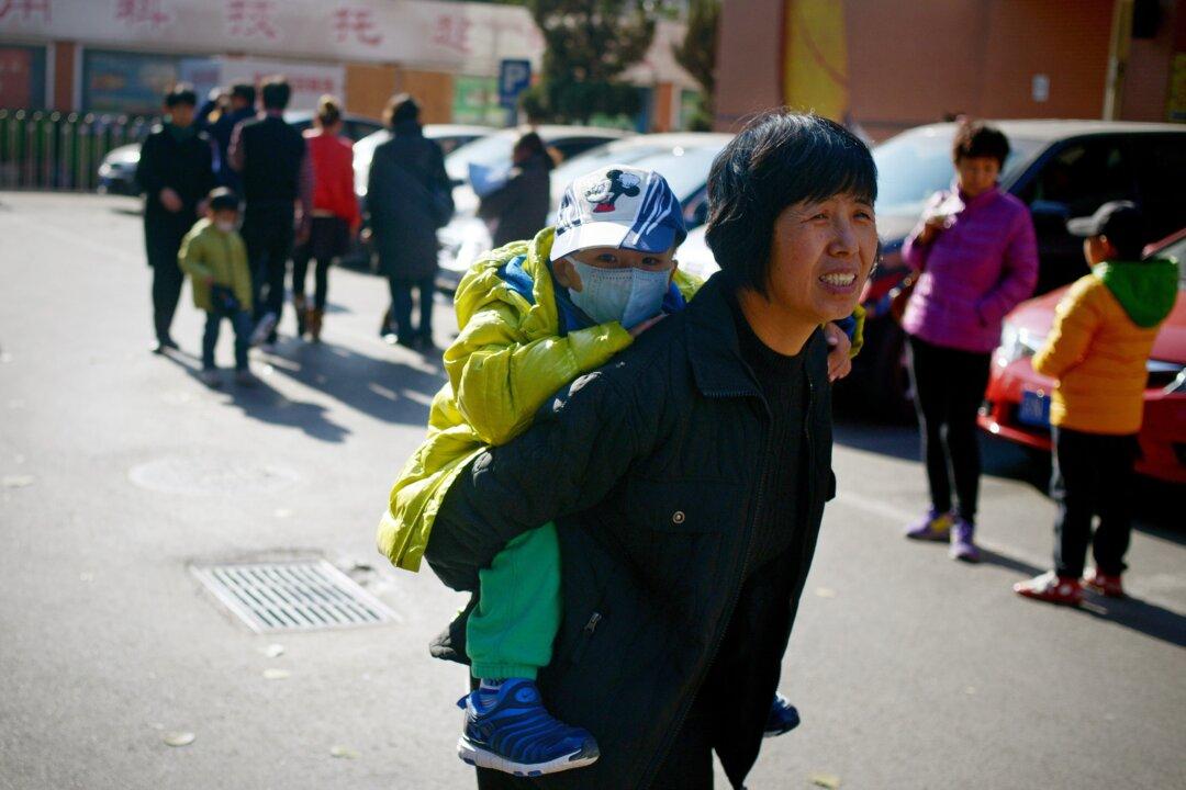 Women Continue to Face Coercion, Crippling Fines Under Two-Child Policy