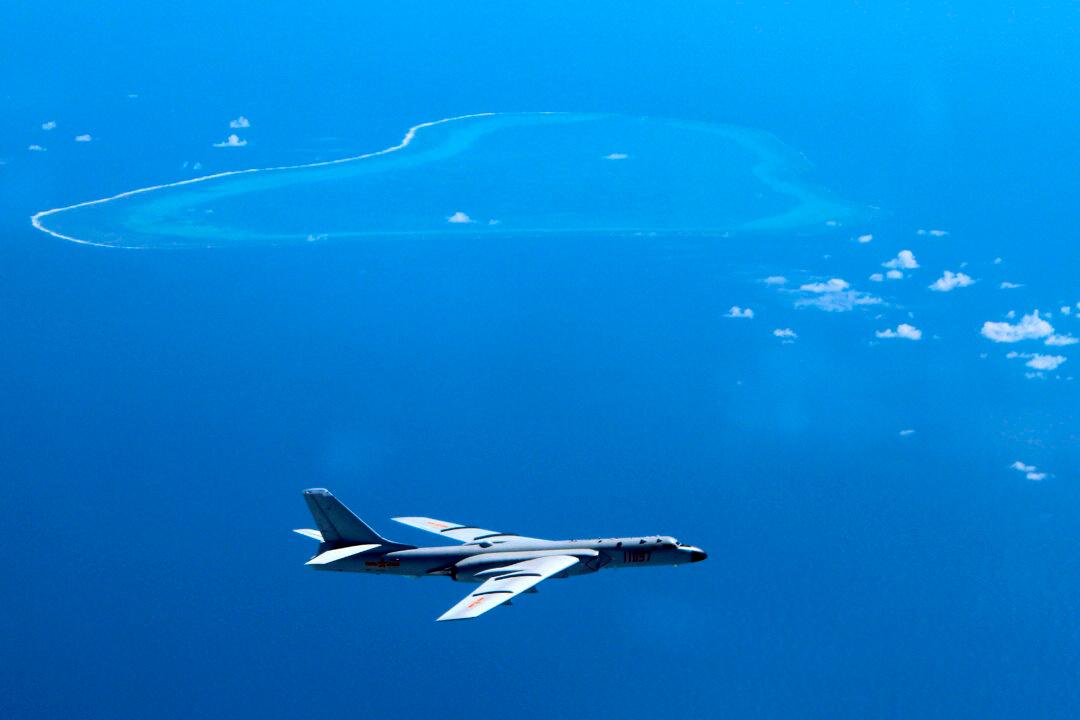 Report: Beijing Adds Weapons to South China Sea Islands