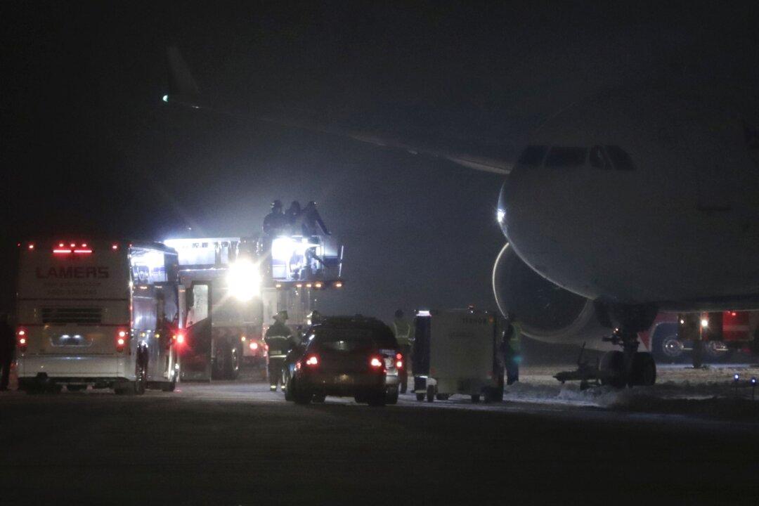 Minnesota Vikings’ Plane Slides Off Wisconsin Runway, Stuck for Hours