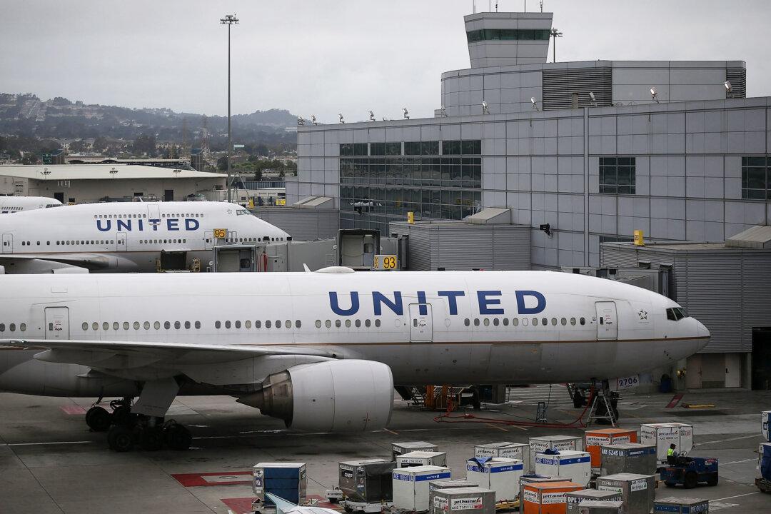 Couple Helps Save United Flight, Then Enjoys Nightmare Honeymoon