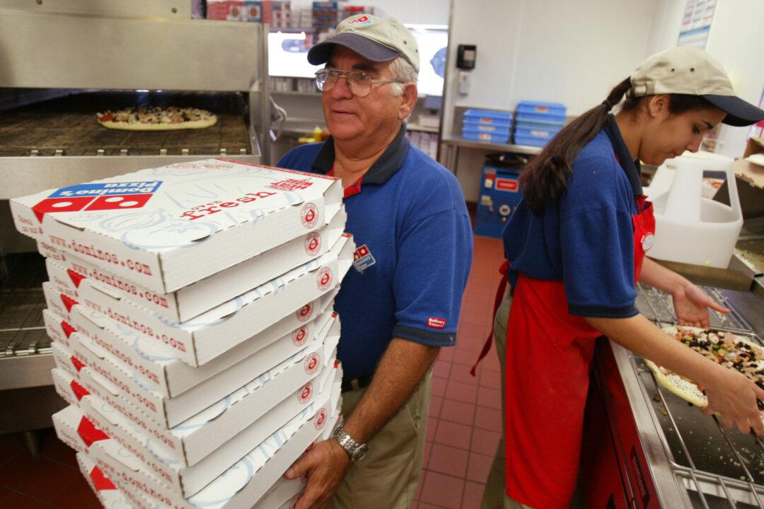 Domino’s Paying Customers to Pick up Their Own Pizza Until May