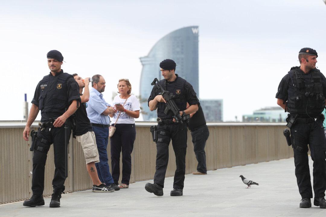 Spain Says Cell Behind Catalan Attacks Dismantled, Police Seek Van Driver