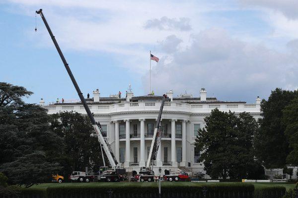 Cranes are seen on the South Lawn of the White House in Washington, on Aug. 8, 2017. (Alex Wong/Getty Images)