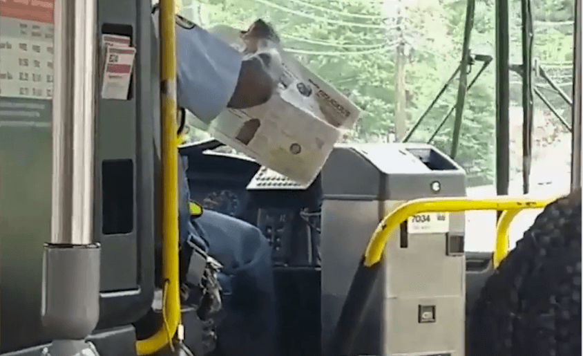 Bus Driver Suspended for Reading Newspaper While Driving