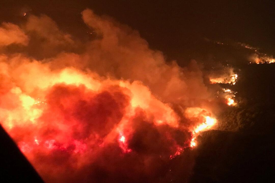 At Least 23 Dead, Hundreds Missing as Winds Fan California Wildfires