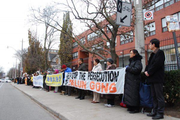 Falun Gong adherents attend a rally outside the Chinese Consulate in Toronto on Nov. 30, 2017, ahead of Prime Minister Justin Trudeau’s trip to China to call for the release of Canadian citizen Sun Qian, as well as family members of Canadian citizens currently illegally imprisoned in China for their practice of Falun Dafa. (Yi Ling/The Epoch Times)
