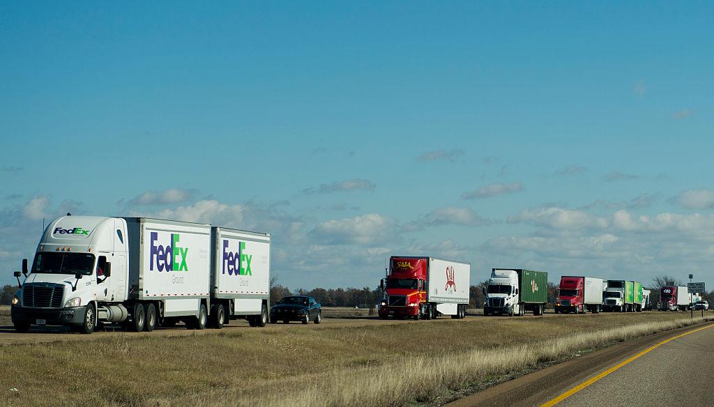 Strong Winds Topple Dozens of Trucks on US Highway