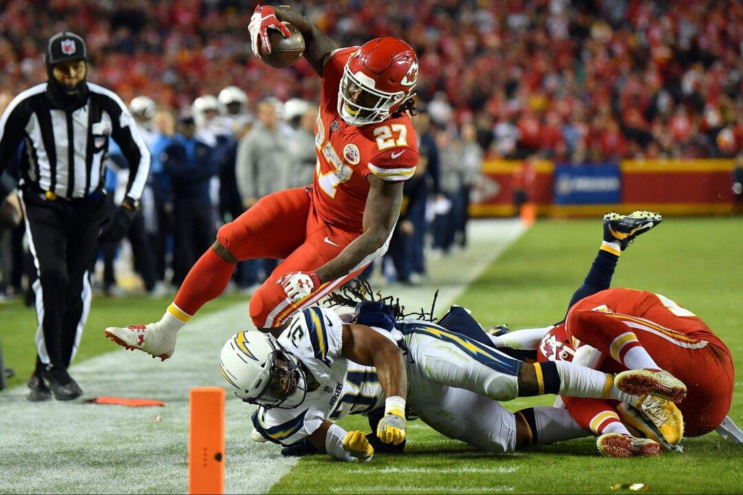 Wife of Chargers Player Jumps From Stands During Injury