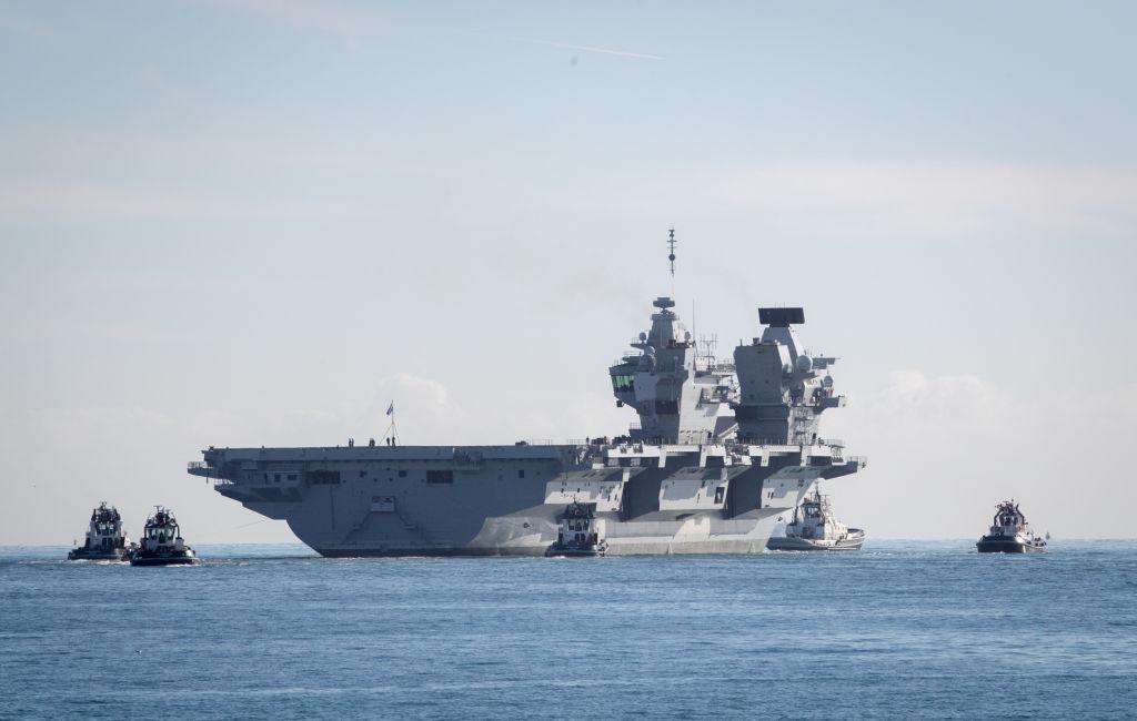 The British Royal Navy's newest aircraft carrier HMS Queen Elizabeth departs Portmouth dockyard, in England, on Oct. 30, 2017. (Matt Cardy/Getty Images)