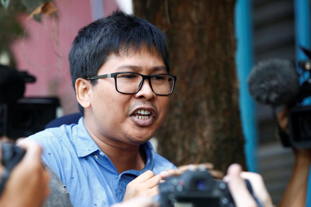 Burmese Prosecutor Seeks Official Secrets Act Charges Against Two Reuters Reporters