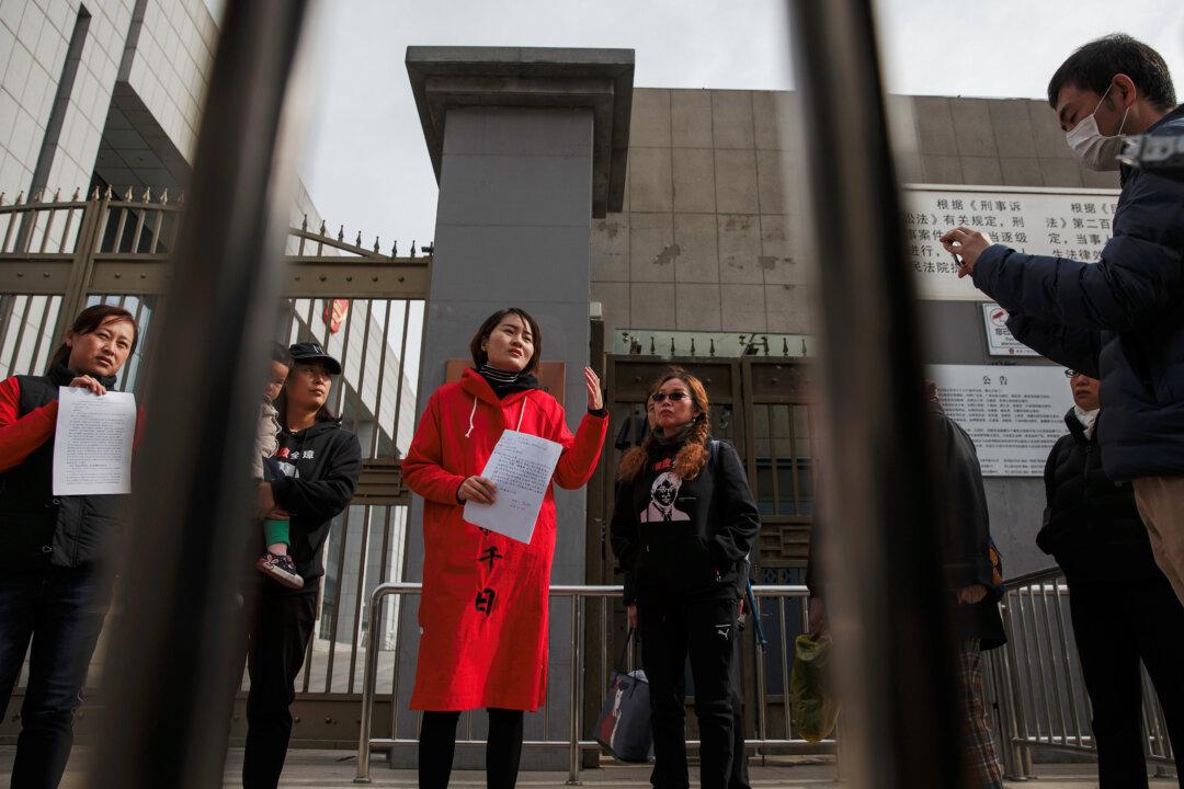 Wife of Detained Chinese Rights Lawyer Placed Under House Arrest, Friend Says