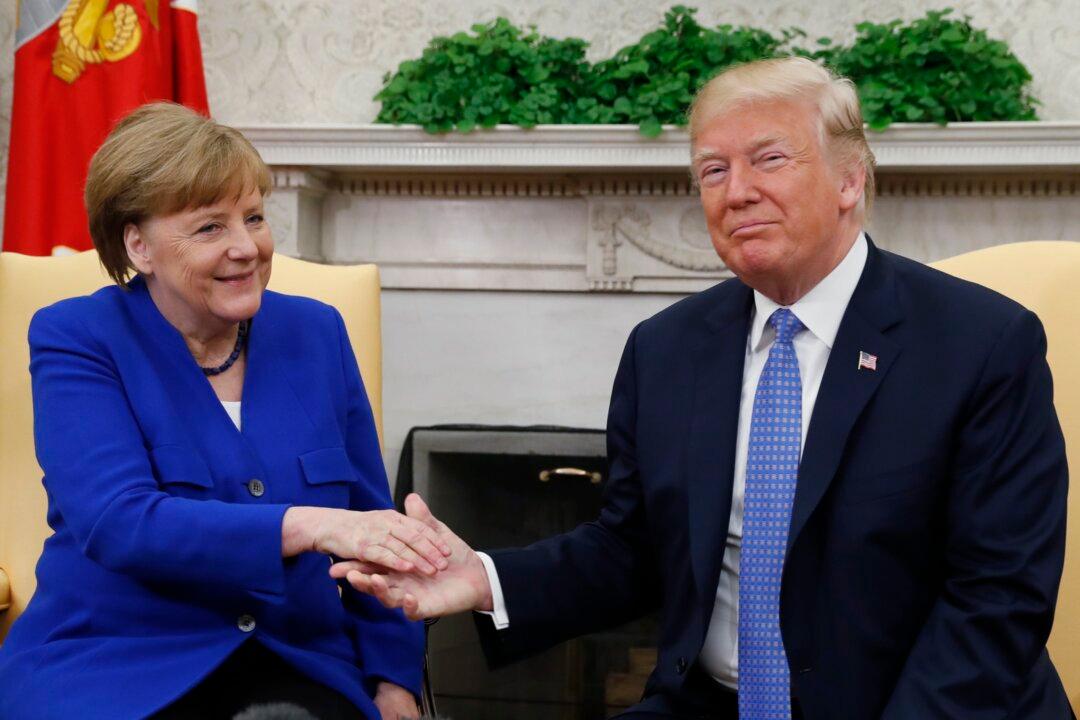 Trump and Merkel Meet Over Iran and Trade