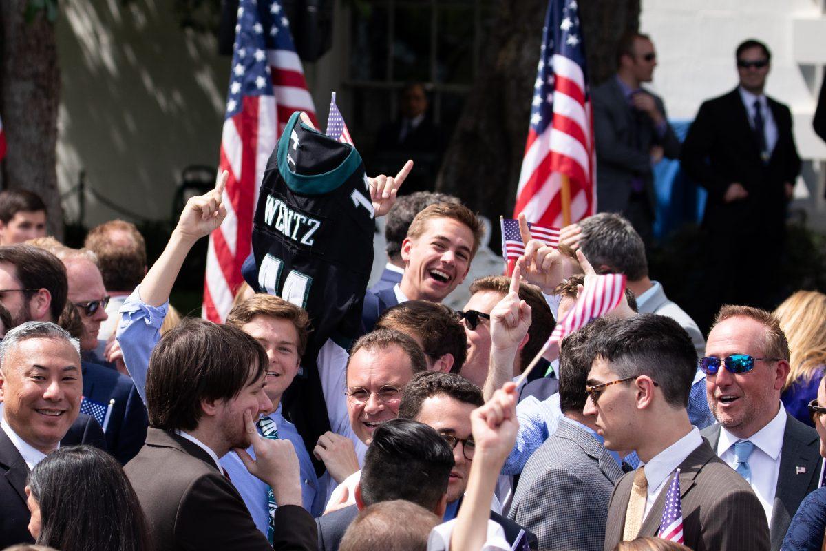 People hold up a Philadelphia Eagles jersey at the Celebration of America on the South Lawn of the White House in Washington on June 5, 2018. (Samira Bouaou/The Epoch Times)
