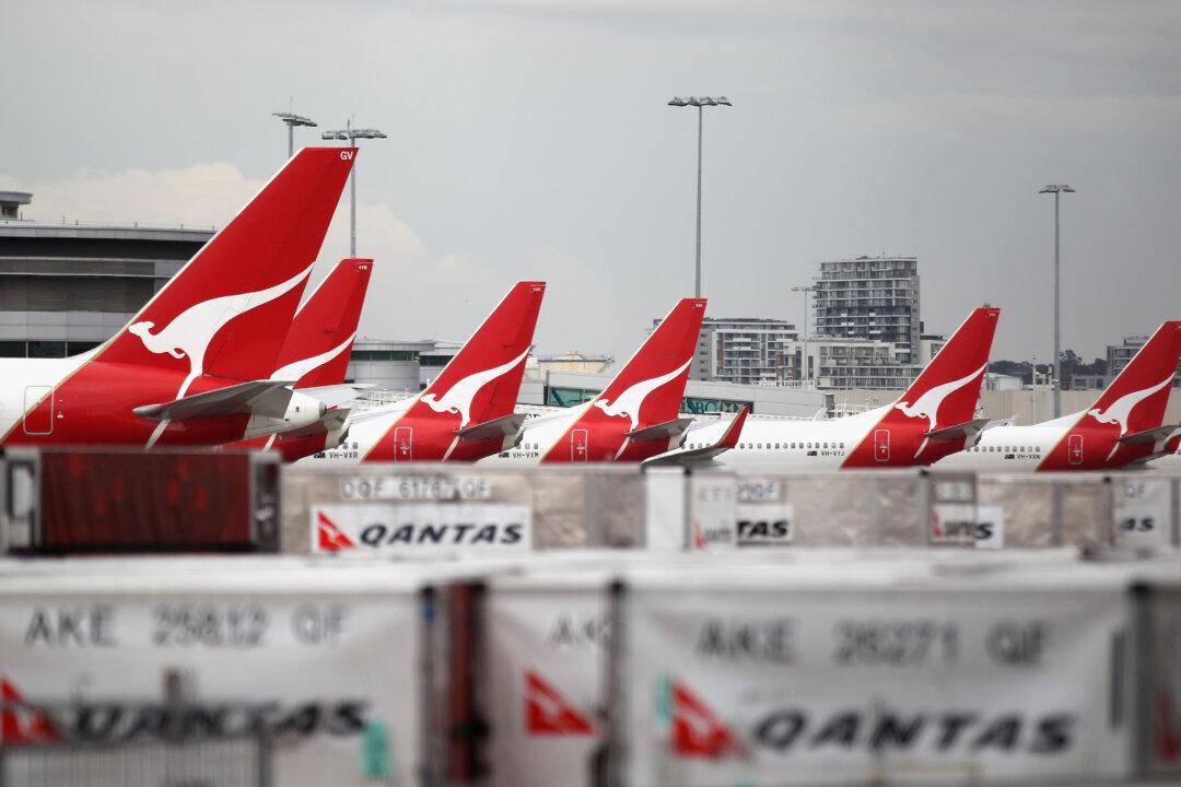 Qantas to Stand Down Most of 30,000 Staff