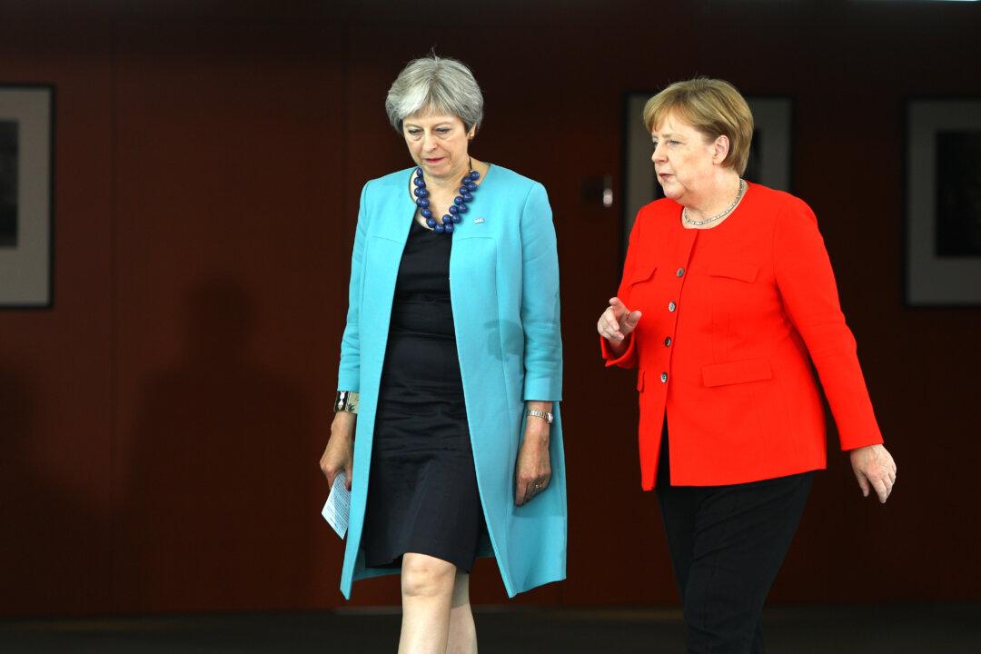 Brexit Negotiations to Resume as May Puts Her Cards on the Table