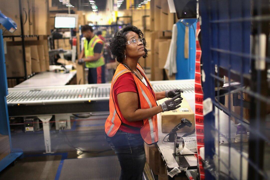 Amazon CEO Says Job Cuts Will Run Through Next Year