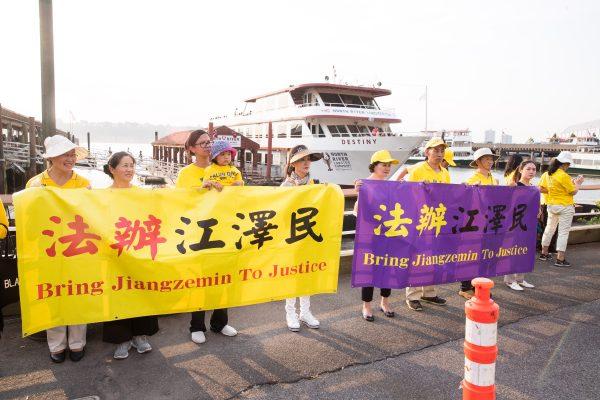 Falun Gong practitioners at the rally calling for an end to the persecution of Falun Gong in China, near the Chinese consulate in Manhattan, New York City, on July 16, 2018. (Larry Dye/The Epoch Times)