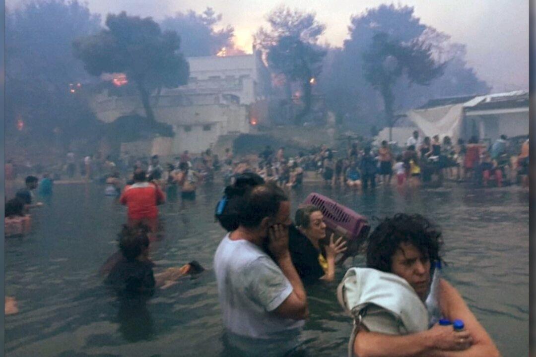 Victims of Greece Wildfires Flee Into Sea to Escape Flames