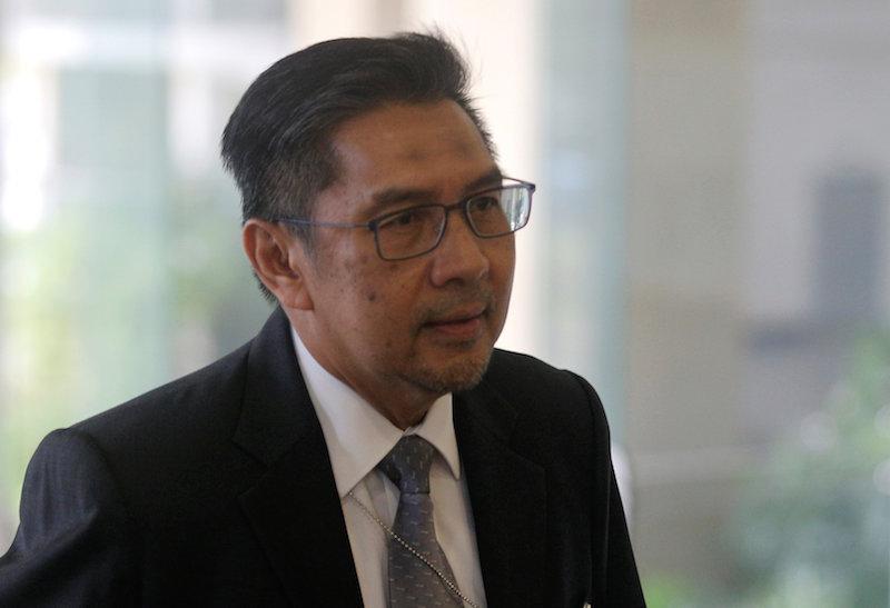 Malaysia Civil Aviation Chief Resigns Over MH370 Lapses