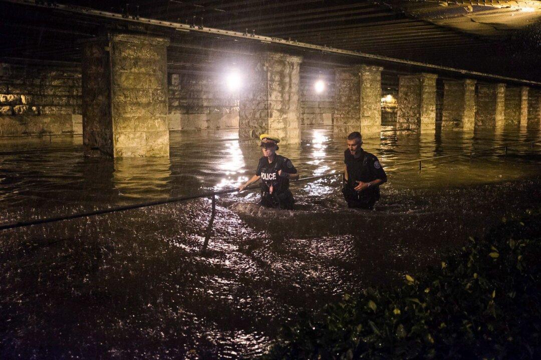 Men Rescued From Flooded Basement Elevator in Toronto