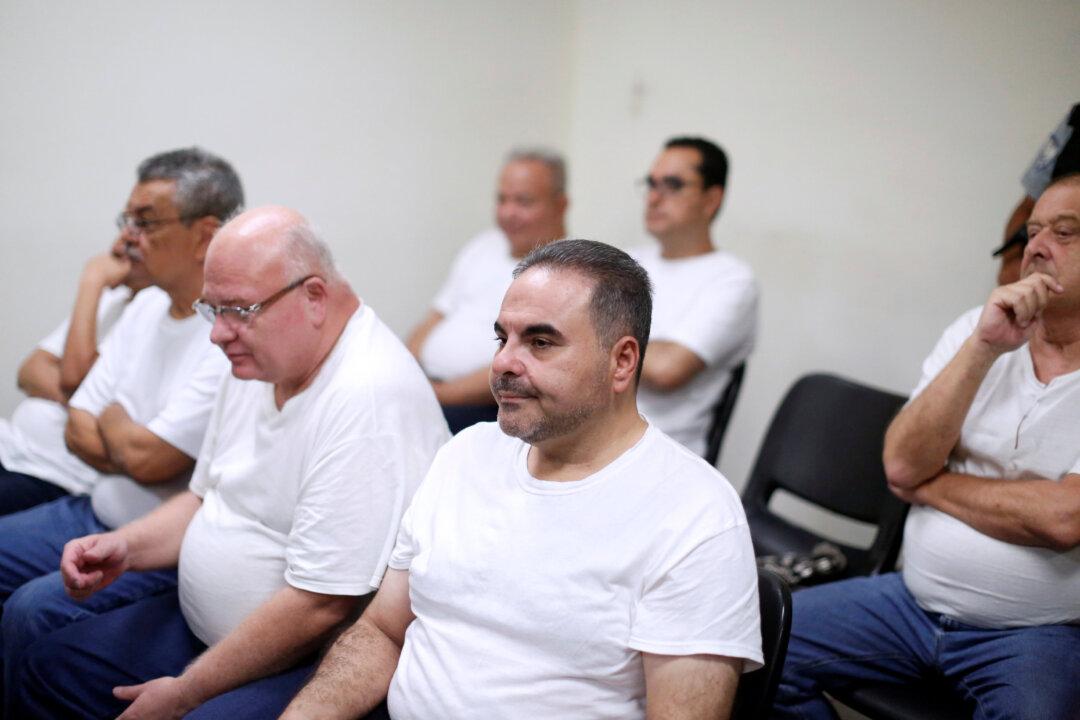 Former El Salvador President Pleads Guilty to Money Laundering