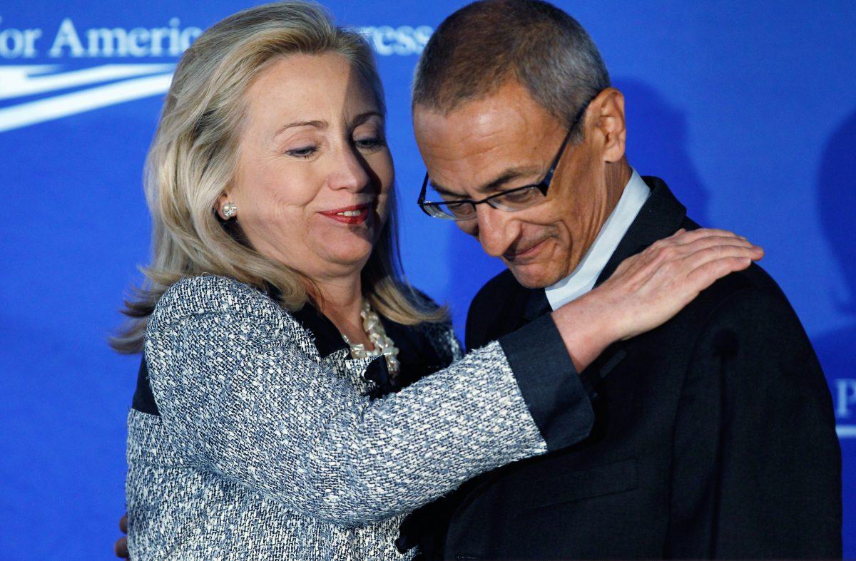 Then-Secretary of State Hillary Clinton and John Podesta, who would become her campaign chairman during the 2016 election, in Washington, on Oct. 12, 2011. (Chip Somodevilla/Getty Images)