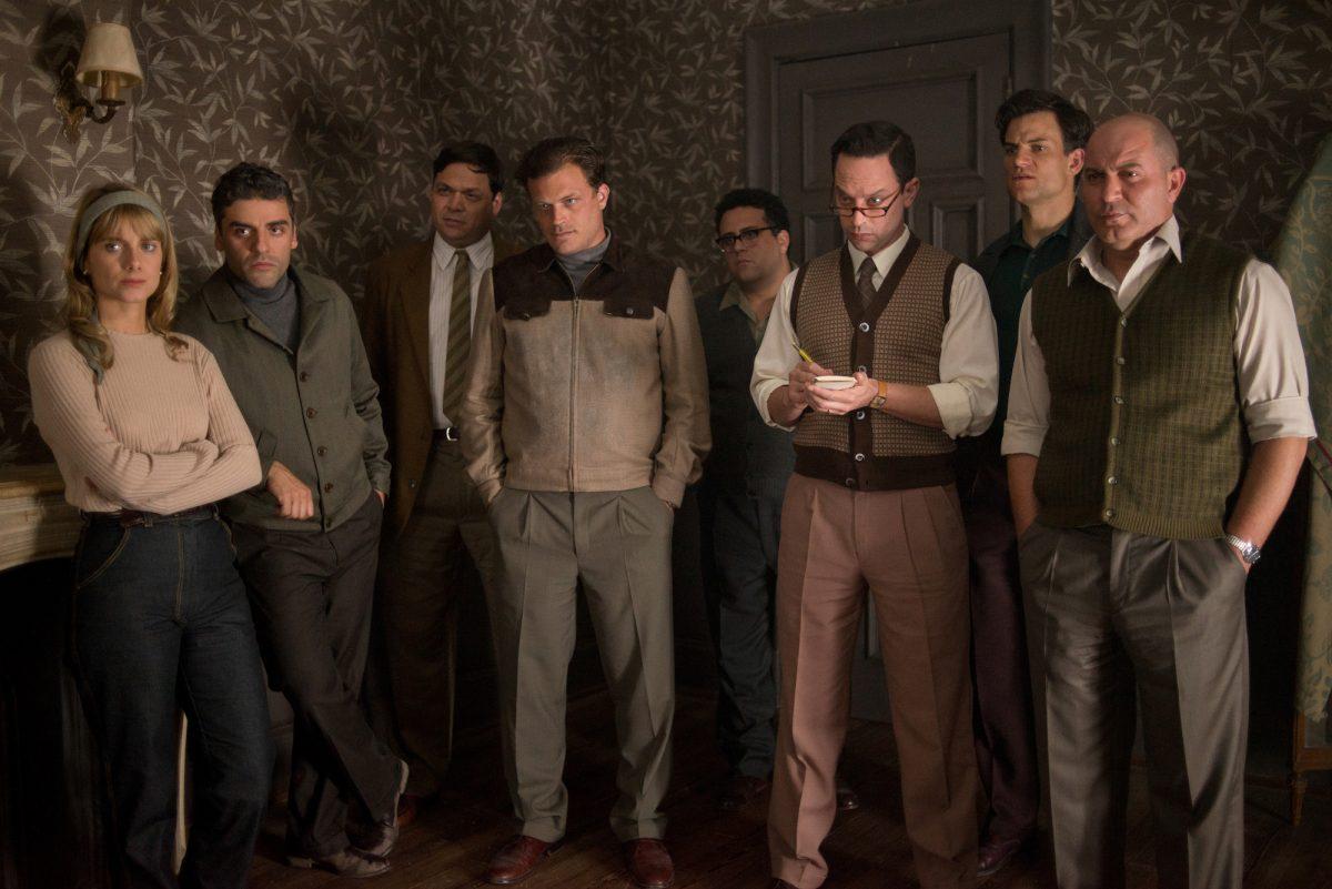 (L–R) Hanna Elian (Mélanie Laurent), Peter Malkin (Oscar Isaac), Ephraim Ilian (Ohad Knoller), Moshe Tabor (Greg Hill), Dani Shalom (Michael Hernandez), Rafi Eitan (Nick Kroll), Yaakov Gat (Torben Liebrecht), and Isser Harel (Lior Raz) play the Mossad agent team who bring Adolf Eichmann to Israeli to stand trial for war crimes, in “Operation Finale.” (Metro Goldwyn Mayer Pictures)