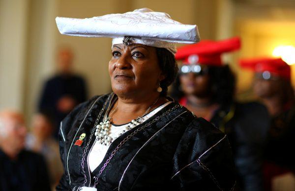 Members of a delegation attend a ceremony to hand back human remains from Germany to Namibia following the 1904-1908 genocide against the Herero and Nama in Berlin on Aug. 29, 2018. (Reuters/Christian Mang)